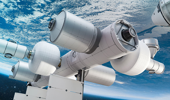 Conceptual illustration of a modular space station orbiting earth, featuring multiple interconnected cylindrical modules.