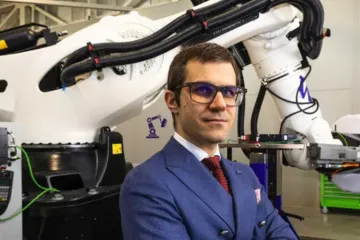 Marco Salviato in front of composites equipment