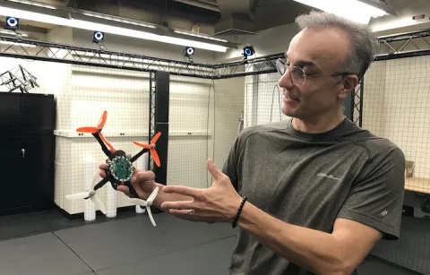 Behçet Açıkmeşe in the Autonomous Control Lab.